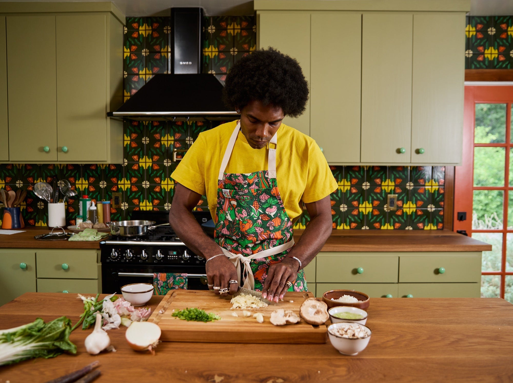 Jerrod is wearing Full Apron from the Kitchen Collection