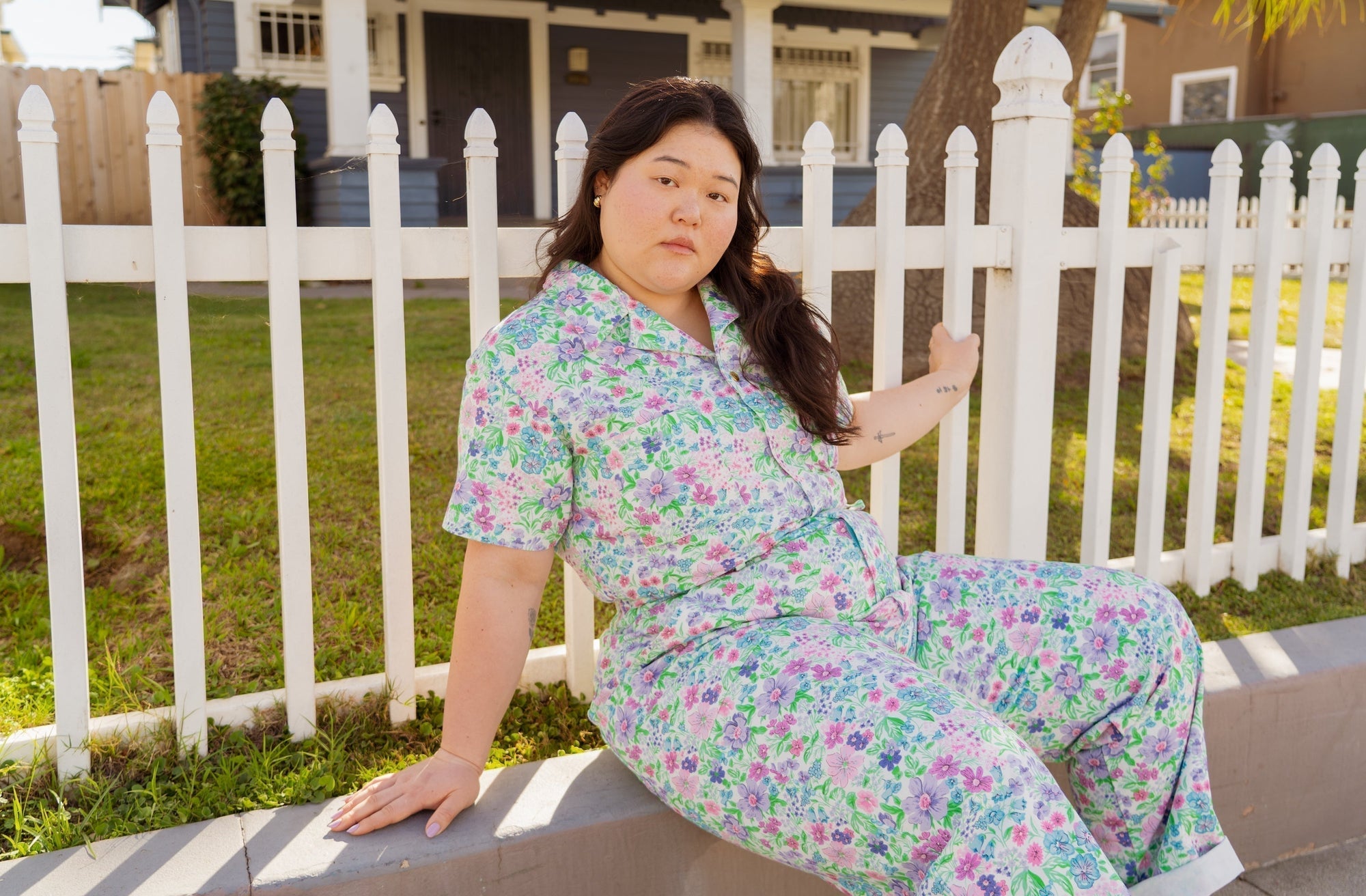 Ashley is wearing Vintage Wallpaper Jumpsuit