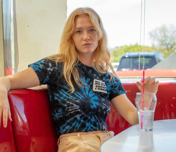 Margaret wearing Tie Dye Tee in Blue Spiral and Trousers in Vintage Off-White