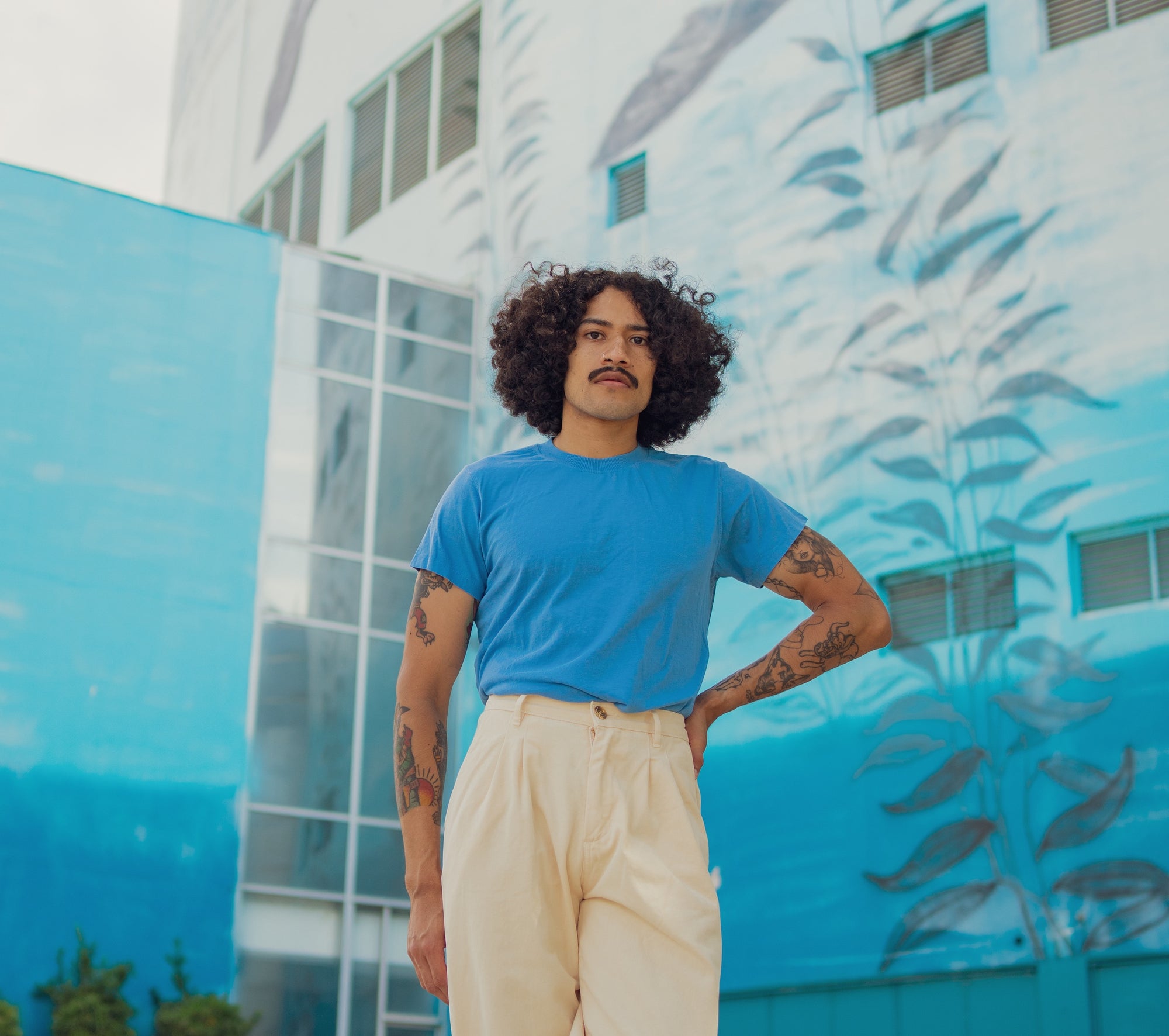 Jesse wearing Organic Vintage Tee in Greek Blue and Heavy Weight Trousers in Vintage Off-White