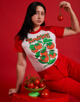 Betty is wearing Short Sleeve Raglan Tee in Tomatoes