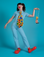 Alex is wearing a short sleeve jumpsuit in baby blue with a red clown nose, red clown shoes and a large polka dot tie