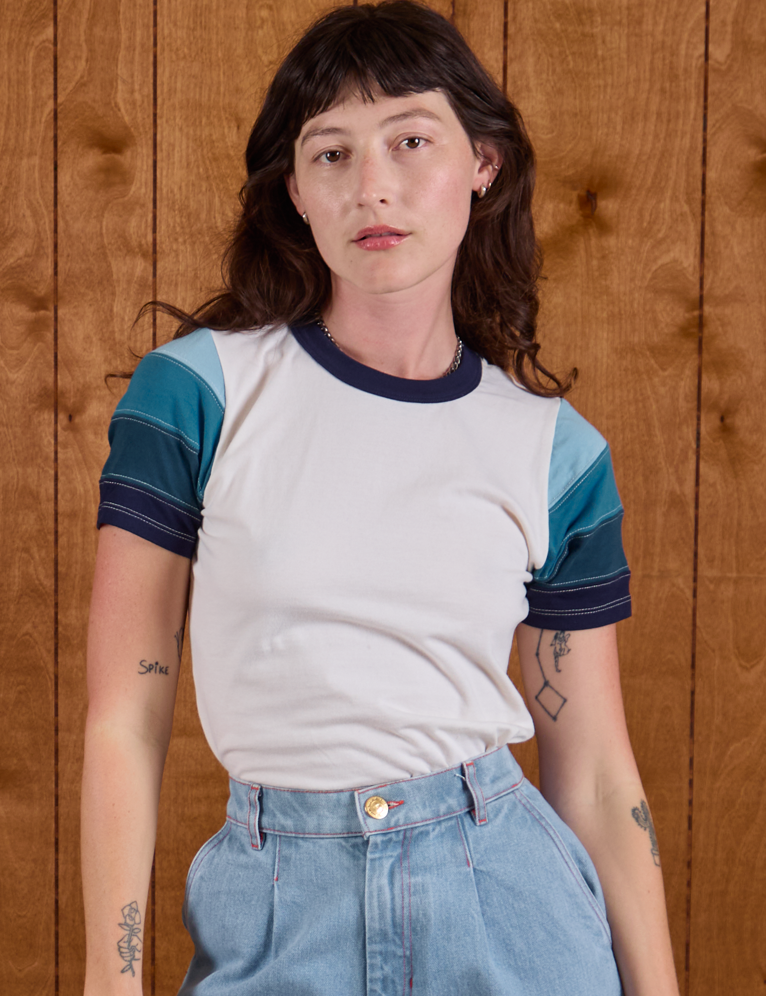 Alex is wearing P Calypso Tee in Ocean
