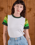 Alex is wearing P Calypso Tee in Forest