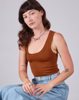 Alex is 5'8" and wearing P Cropped Tank Top in Burnt Terracotta
