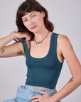 Alex is 5'8" and wearing P Cropped Tank Top in Lagoon