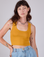 Alex is 5'8" and wearing P Cropped Tank Top in Mustard Yellow