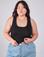 Ashley is 5'7" and wearing L Cropped Tank Top in Basic Black