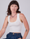 Alex is 5'8" and wearing P Cropped Tank Top in Vintage Tee White