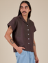 Anthony is 5’6” and wearing S Pantry Button-Up in Espresso Brown