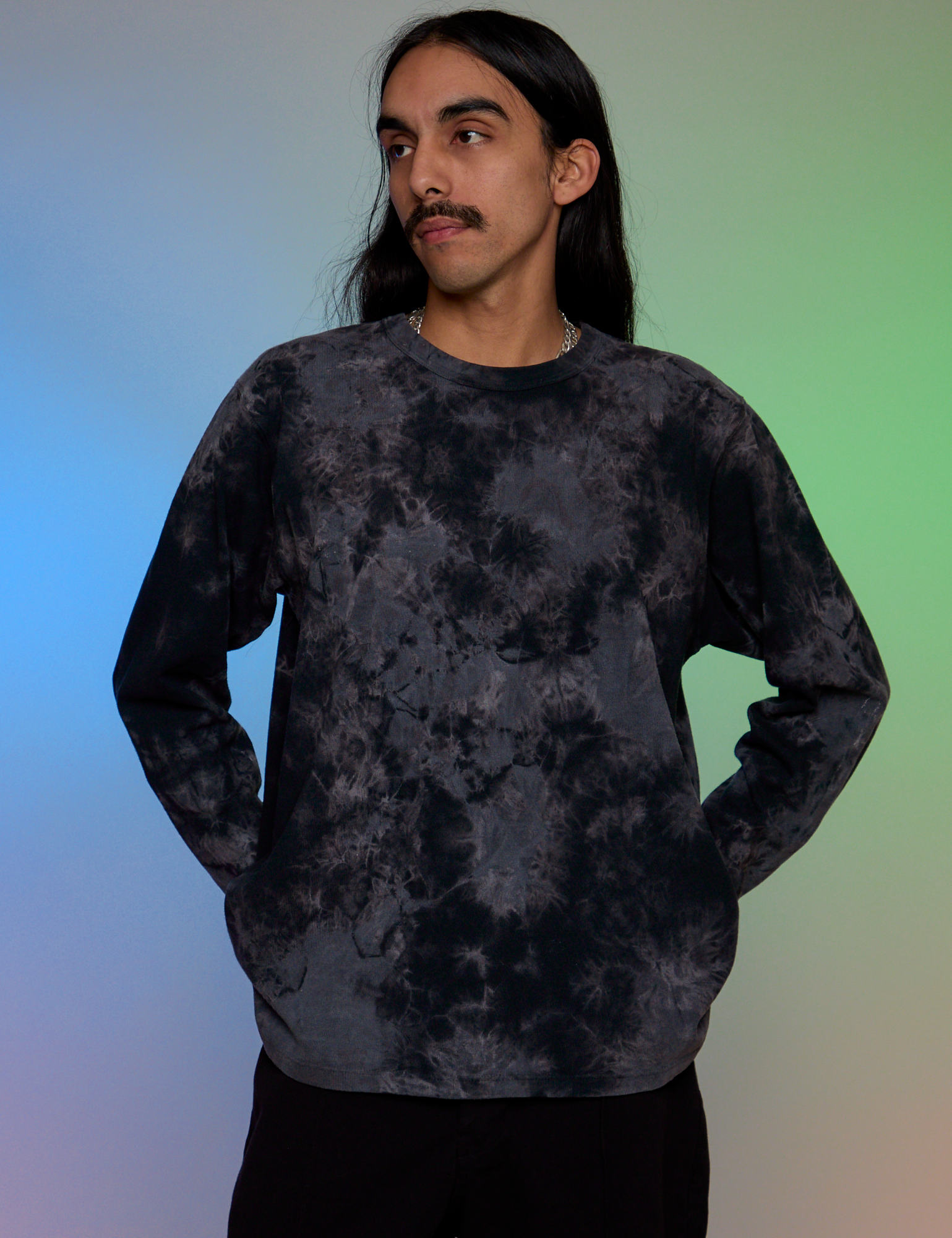Anthony is 5’6” and wearing S Magic Waters Long Sleeve Burly Tee in Black