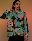 Anthony is 5’6” and wearing S Magic Waters Long Sleeve Burly Tee in Rainbow