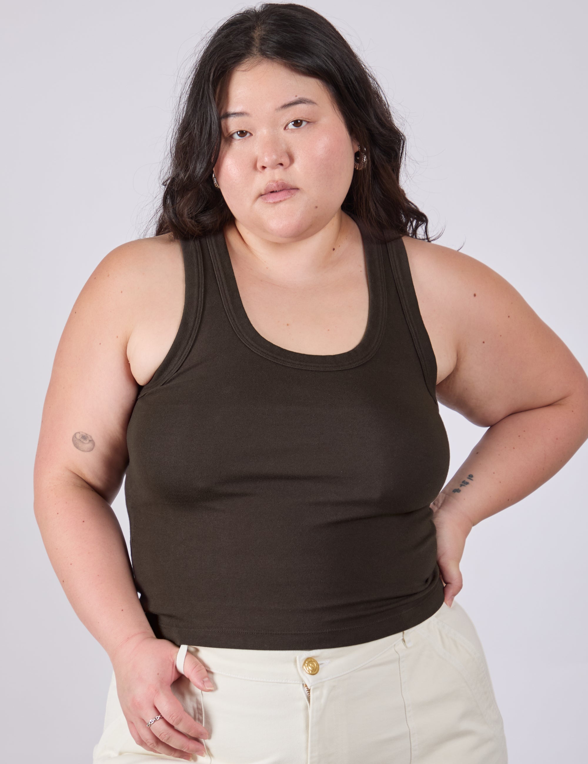 Ashley is 5'7" and wearing L ank Top in Espresso Brown