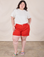 Ashley is 5’7” and wearing 1XL Classic Work Shorts in Mustang Red paired with Organic Vintage Tee in Vintage Tee Off-White