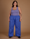 Kristen is 5'9" and wearing 2XL Cornflower Blue Action Pant with the Faded Grape Cropped Tank