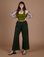 Sydney is 5’9” and wearing M Action Pants in Swamp Green paired with olive green Cropped Tank
