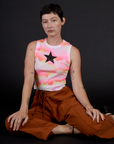 Alex is 5’8” and wearing XXS Black Star Airbrush Muscle Tee