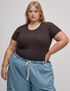 Juliet is 5'7" and wearing L Baby Tee in Espresso Brown