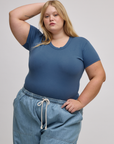 Juliet is 5'7" and wearing L Baby Tee in French Blue