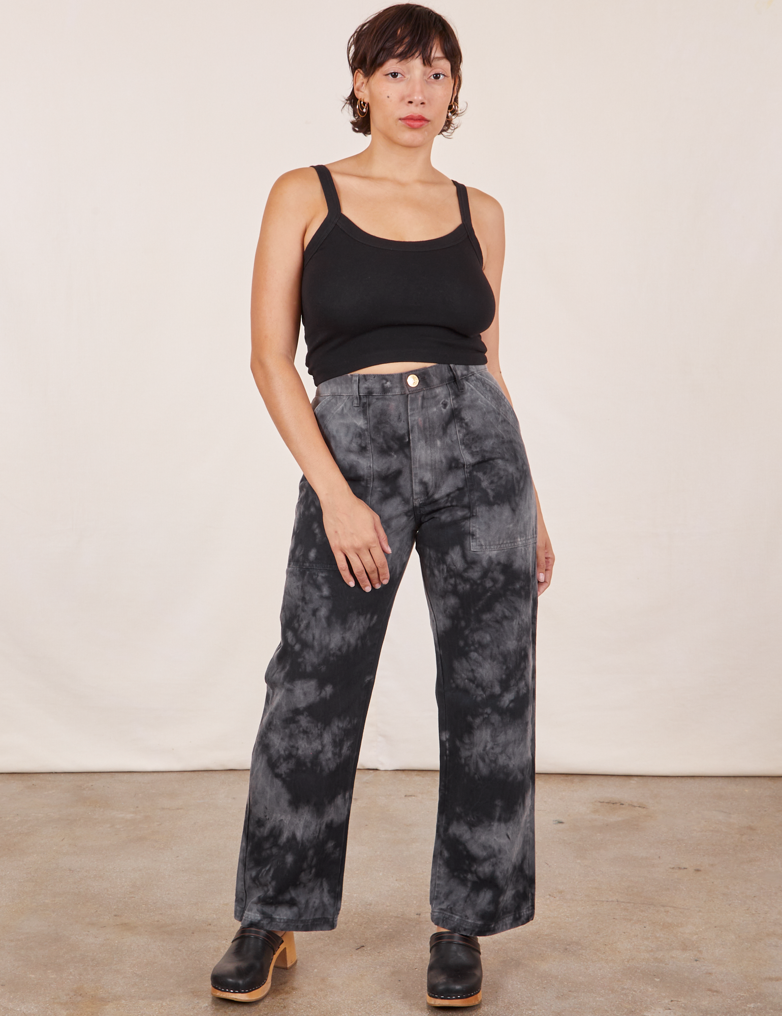 Tiara is 5&#39;4&quot; and wearing S Black Magic Waters Work Pants paired with black Cropped Cami