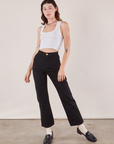 Alex is 5'8" and wearing XS Work Pants in Black paired with a Cropped Tank in vintage tee off-white