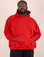 Elijah is 6'0" and wearing 2XL Oversized Hoodie in Mustang Red