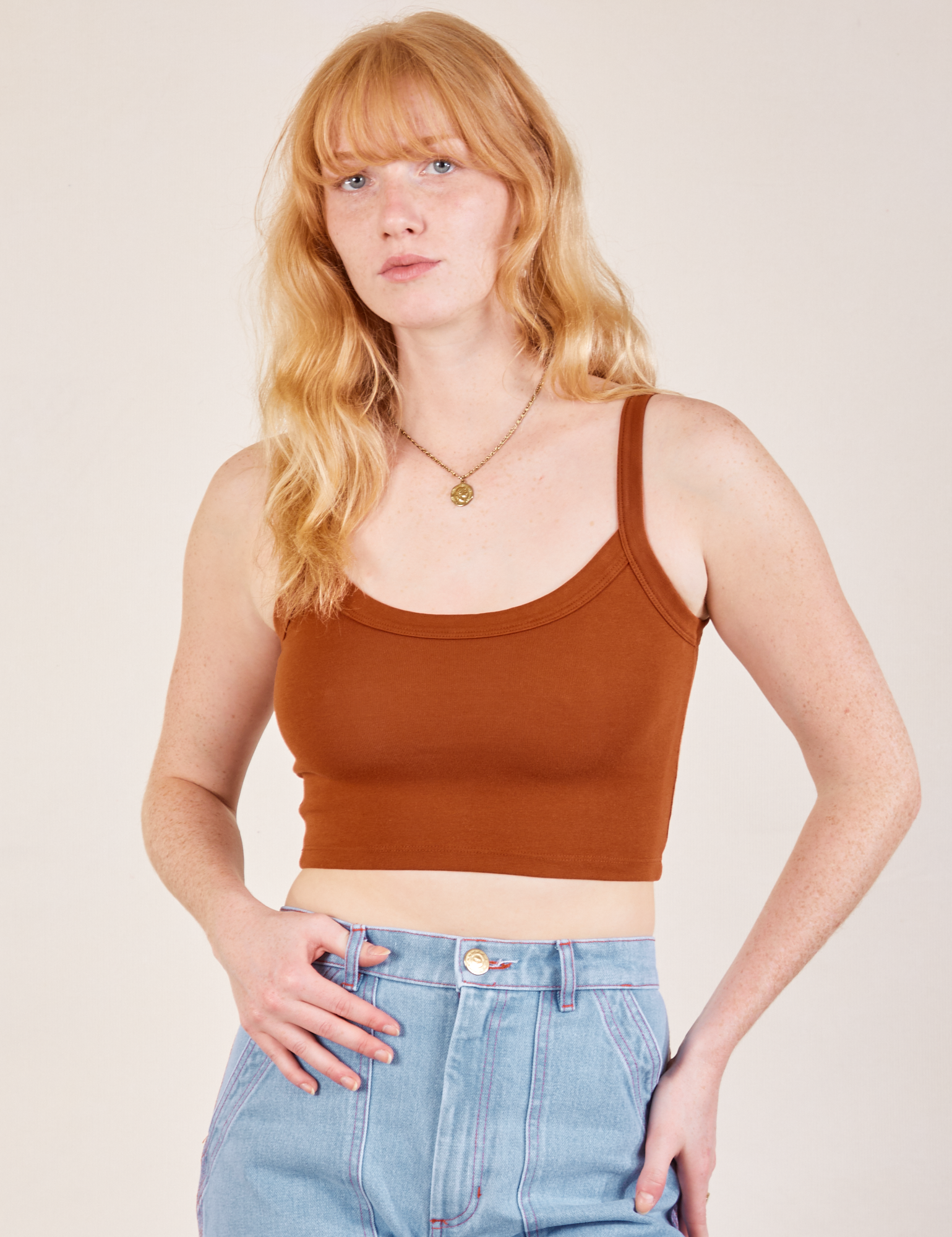 Margaret is 5’11” and wearing P Cropped Cami in Burnt Terracotta