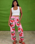 Kandia is 5'3" and wearing XS Cherry Paintstamped Work Pants in Bubblegum Pink paired with a Cropped Tank in Vintage Tee Off-White
