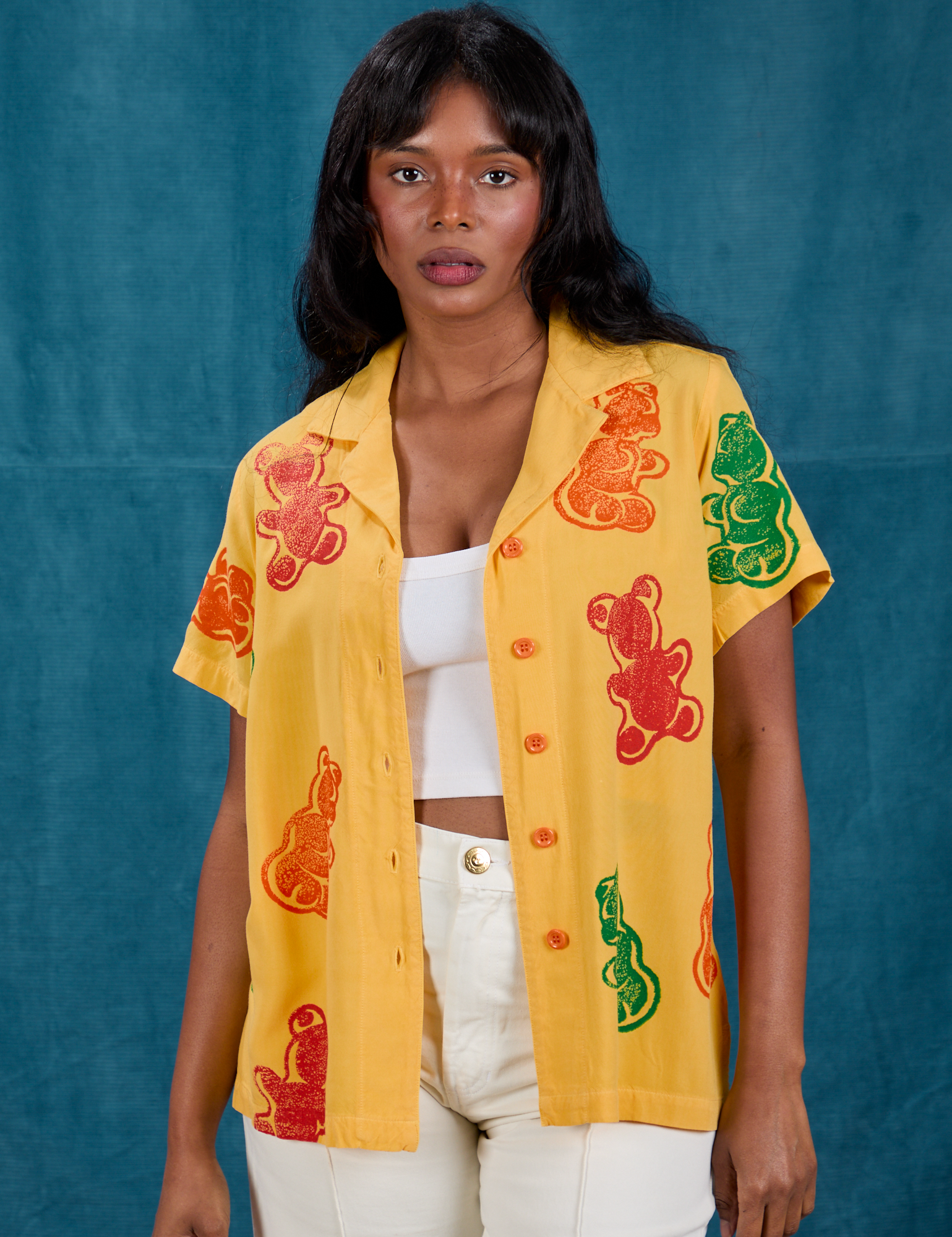 Kandia is 5'3" and wearing XXS Gummy Bear Pantry Button-Up 