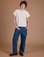 Quinn is 6’3” and wearing M Carpenter Jeans in Dark Wash paired with the Organic Vintage Tee in Vintage Tee Off-White