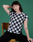 Alex is wearing Checker Organic Tee in Black
