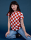 Alex is 5'8" and wearing P Checker Organic Tee in Red