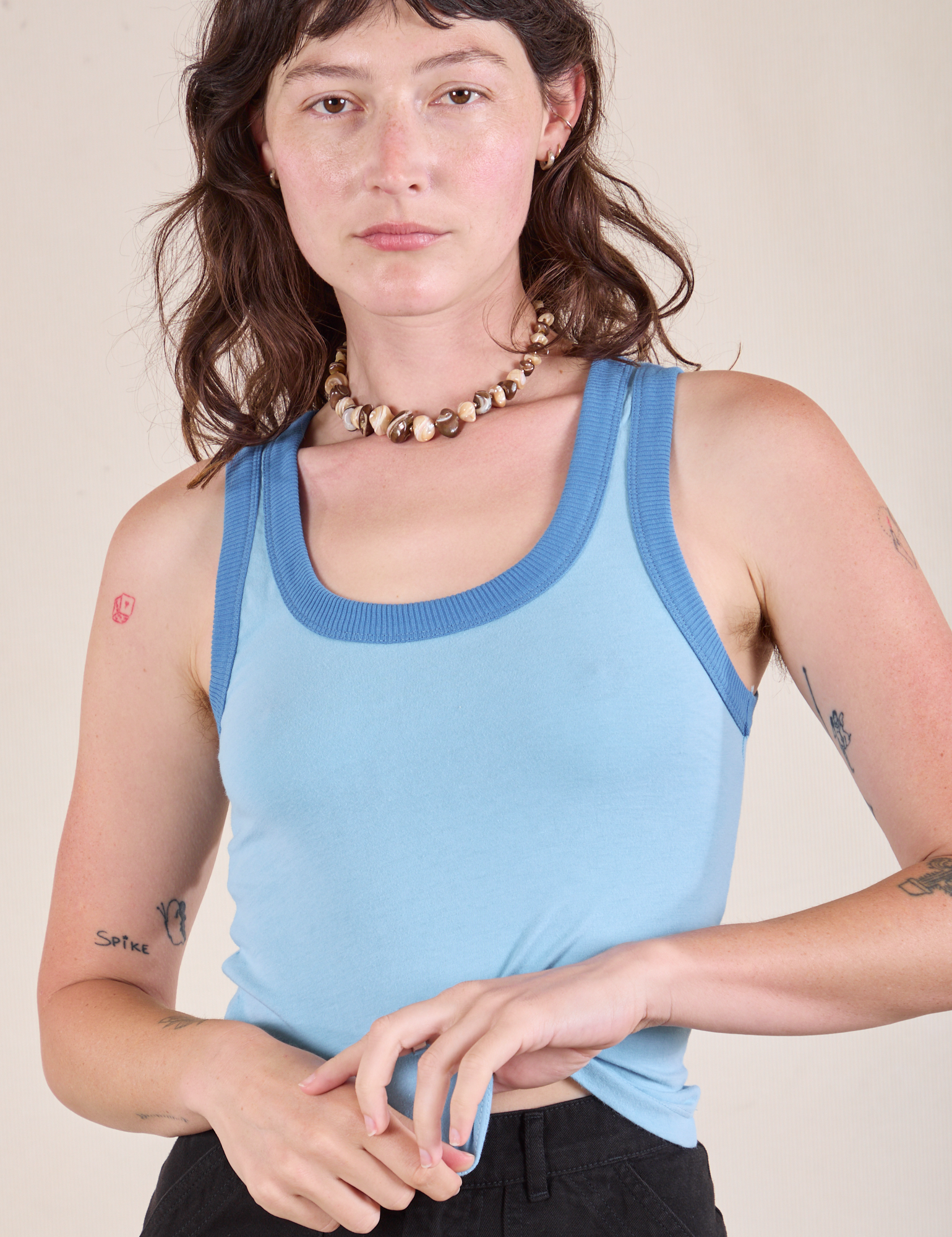 Alex is 5'8" and wearing P Colorblock Cropped Tank in Baby Blue