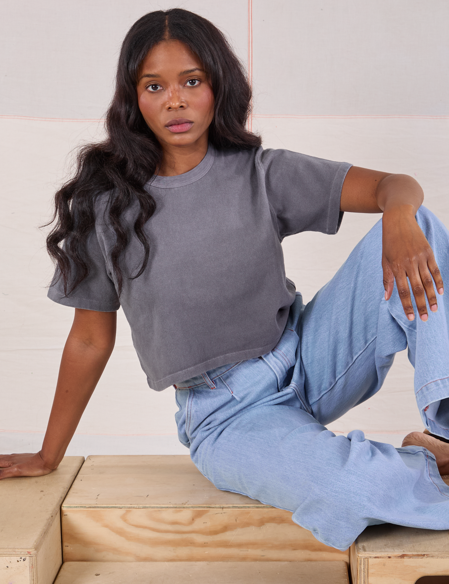 Kandia is 5'3" and wearing P Cropped Burly Tee in Washed Grey