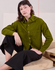 Alex is wearing Cropped Overshirt in Summer Olive