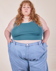 Catie is 5'11" and wearing 4XL Cropped Tank Top in Marine Blue