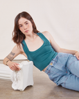 Hana is wearing Cropped Tank Top in Marine Blue and light wash Carpenter Jeans