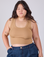 Ashley is 5'7" and wearing L Cropped Tank Top in Tan