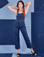 Alex is 5'8"and wearing P Indigo Denim Original Overalls in Dark Wash