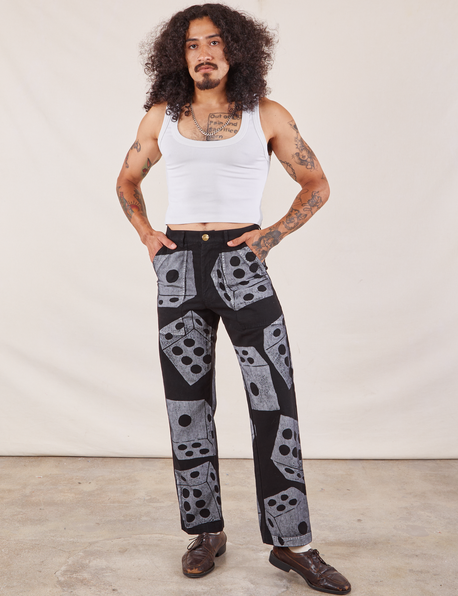 Jesse is 5'8" and wearing XS Icon Work Pants in Dice (Black)