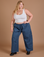 Juliet is 5’7” and wearing 1XL Drop Pocket Cargo Pants in French Blue paired with a Cropped Tank in Vintage Tee White
