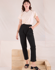 Alex is 5'8" and wearing P Easy Pants in Basic Black paired with Organic Vintage Tee Off-White in vintage tee off-white