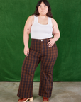Ashley is 5'7" and wearing 0XL Gingham Western Pants in Fudge Brown paired with Cropped Tank in vintage tee off-white