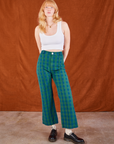 Margaret is 5'11" and wearing XS Gingham Western Pants in Green paired with a Cropped Tank in vintage tee off-white