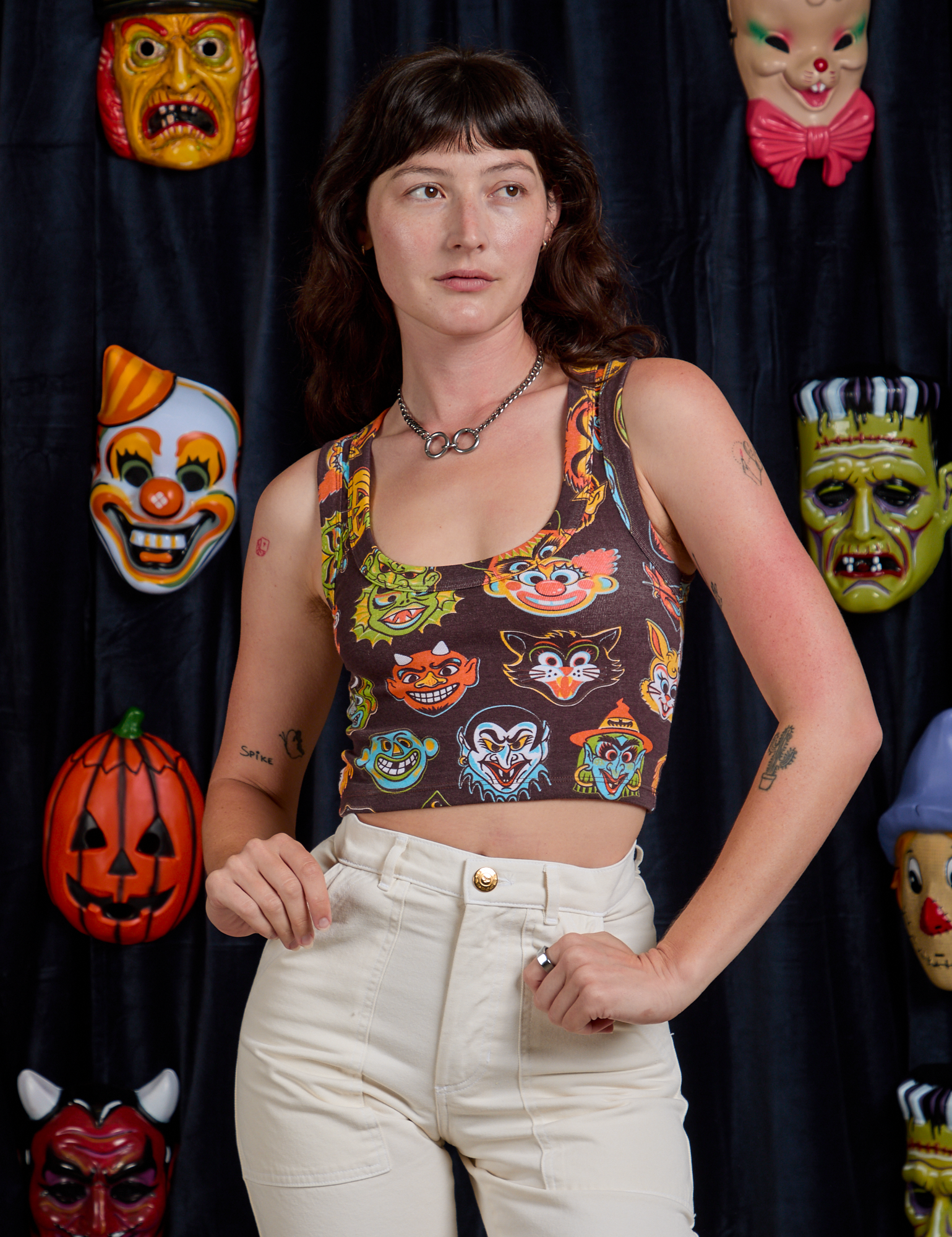 Alex is is 5&#39;8&quot; and wearing P Cropped Tank Top in Halloween Masks