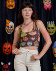 Alex is is 5'8" and wearing P Cropped Tank Top in Halloween Masks