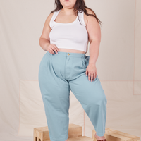 Ashley is 5'7" and wearing 1XL Petite Heavyweight Trousers in Baby Blue paired with vintage off-white Cropped Tank Top