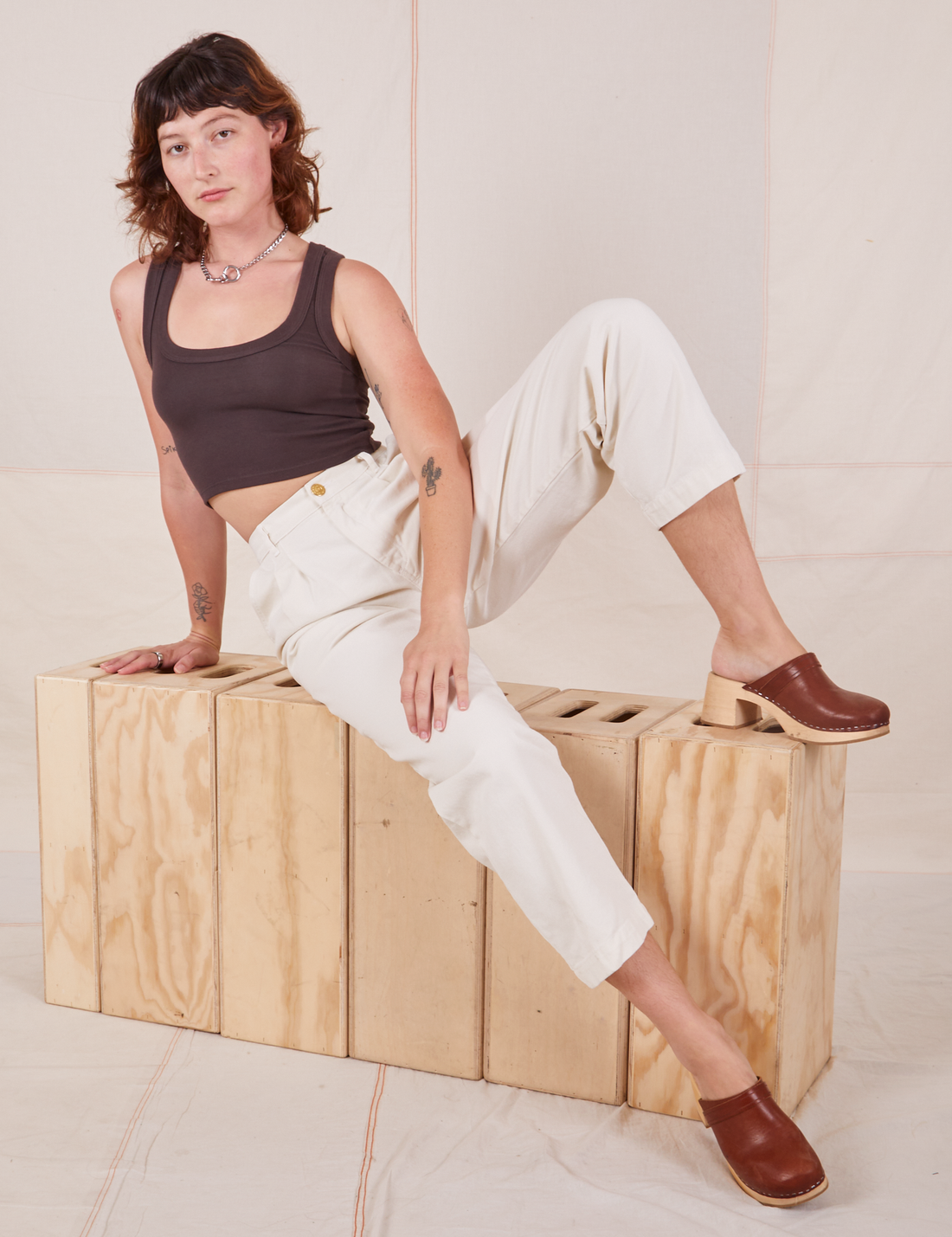 Alex is 5'8" and wearing XXS Heavyweight Trousers in Vintage Off-White paired with espresso brown Cropped Tank Top.