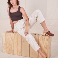 Alex is 5'8" and wearing XXS Heavyweight Trousers in Vintage Off-White paired with espresso brown Cropped Tank Top.