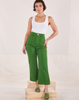 Soraya is 5'3" and wearing XXS Petite Heritage Westerns in Lawn Green paired with vintage off-white Cropped Tank Top